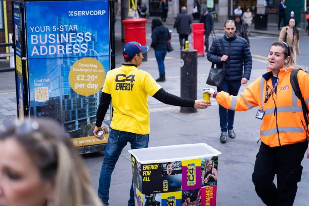 The Ultimate Guide to Brand Activation - C4 energy passing out drink samples in London