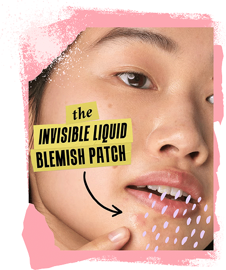 Woman applying blemish patch on skin